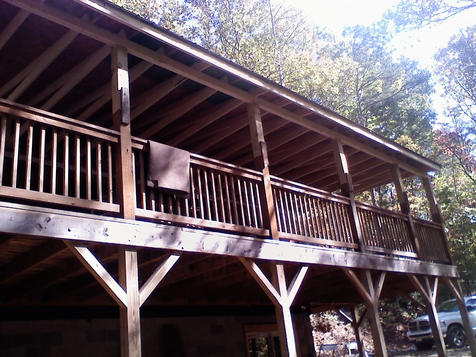 Timber framing under a new elevated porch and deck — Roof Leak Repair in Hawley by Roofing Brothers
